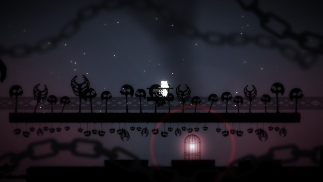 Elin above a glowing spark in a cage