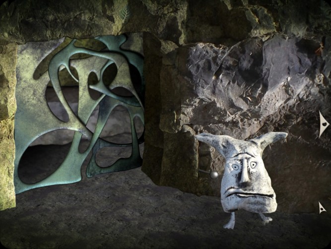 clay head with feet in front of door